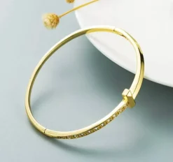 Guldarmring med 18K förgyllning med CZ>Celine Estelle Discount