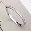 Silverarmring med CZ>Celine Estelle