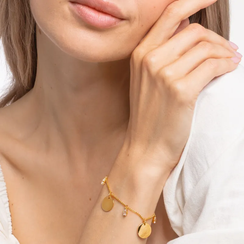 Armband med tre hängsmycke och vita stenar guld – A1962-414-39>Thomas Sabo