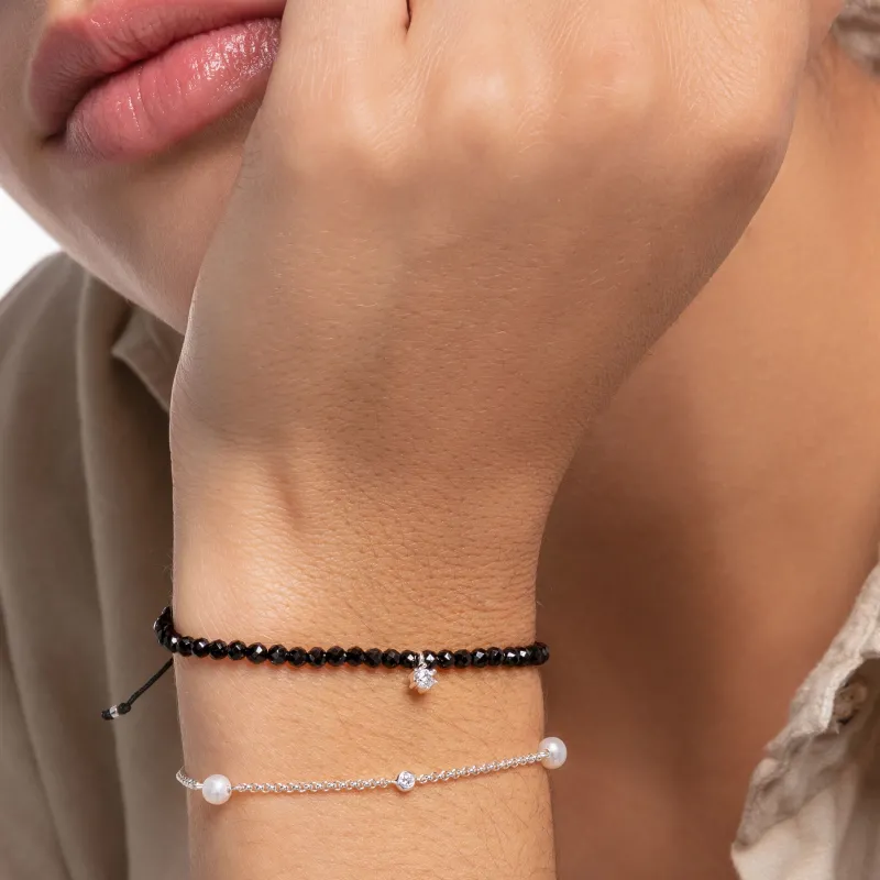 Armband svarta pärlor med vit sten – A1987-401-11>Thomas Sabo