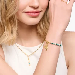 Charm-hängsmycke klöverblad guldpläterad>Thomas Sabo